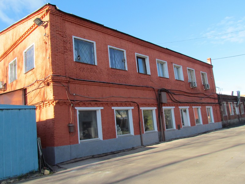Покраска кирпичного фасада здания завода