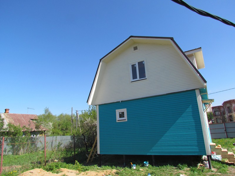 Покраска фасада деревянного дома (Истринский район)